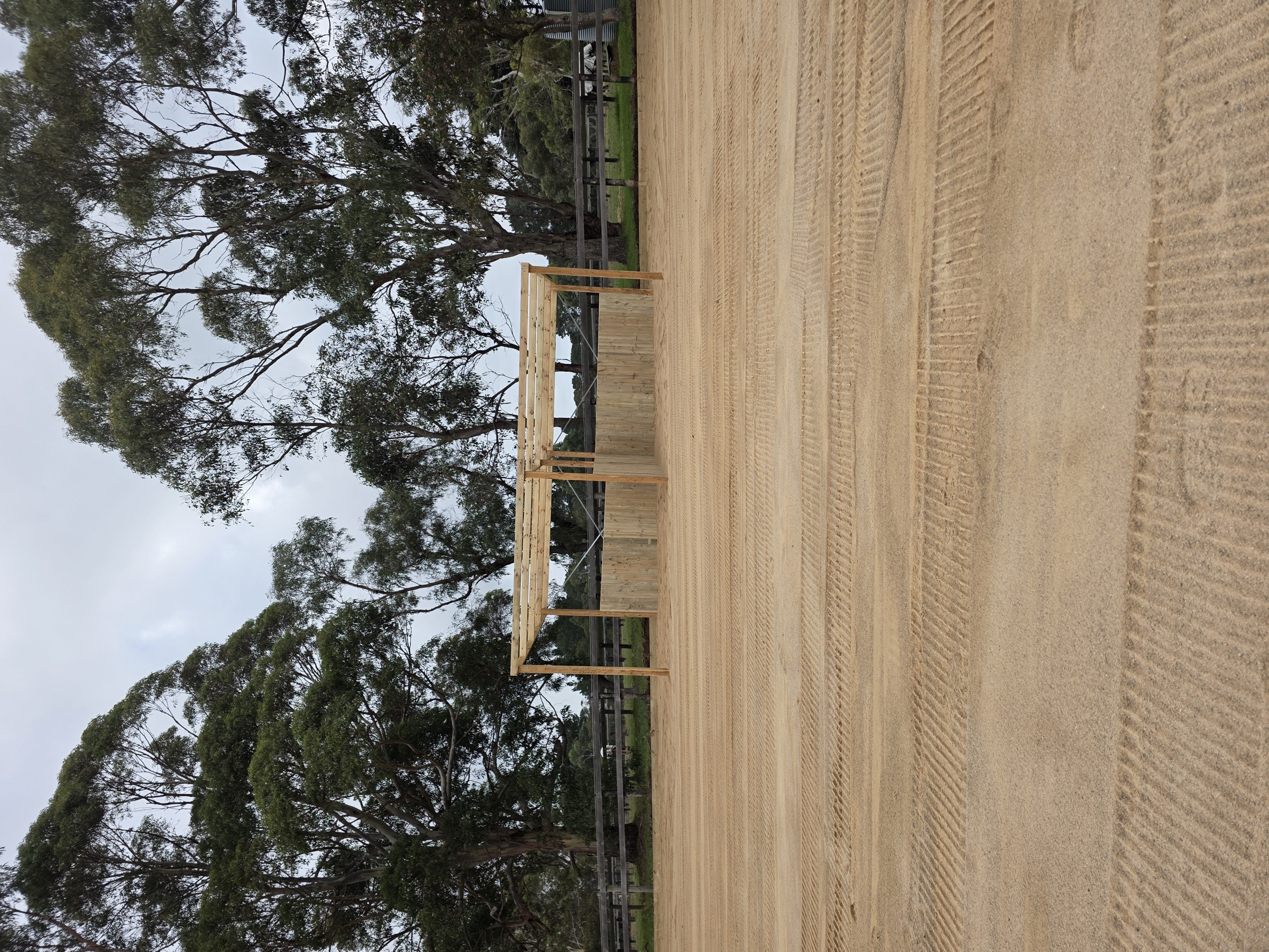 Original camera photograph of the Merricks North outdoor arena surface