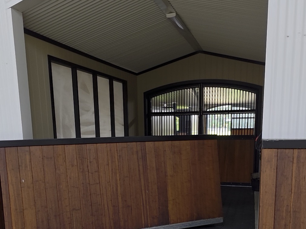 Original Aberdeen camera frame showing the timber stable row and arched stall fronts